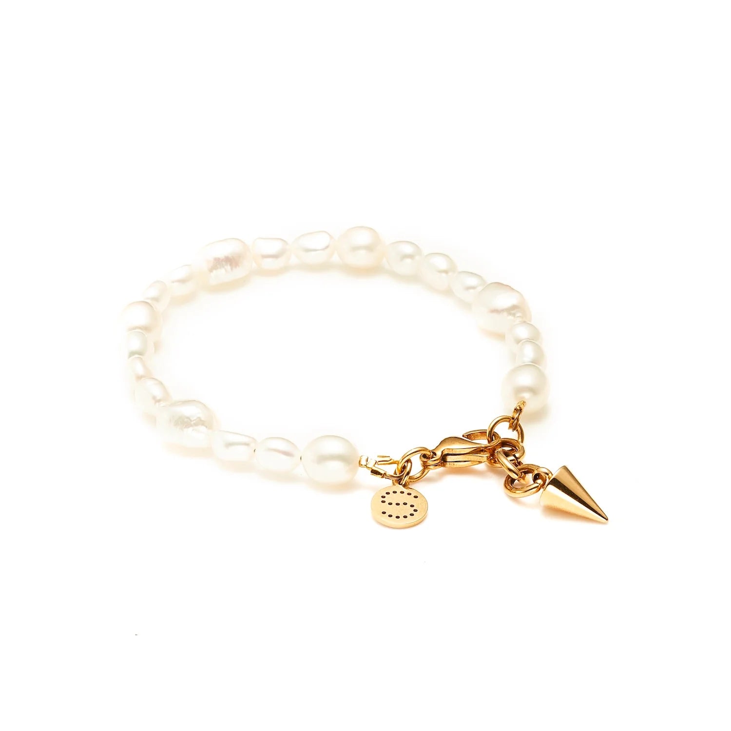 Bracelet with pearl beads and gold charm on a white background